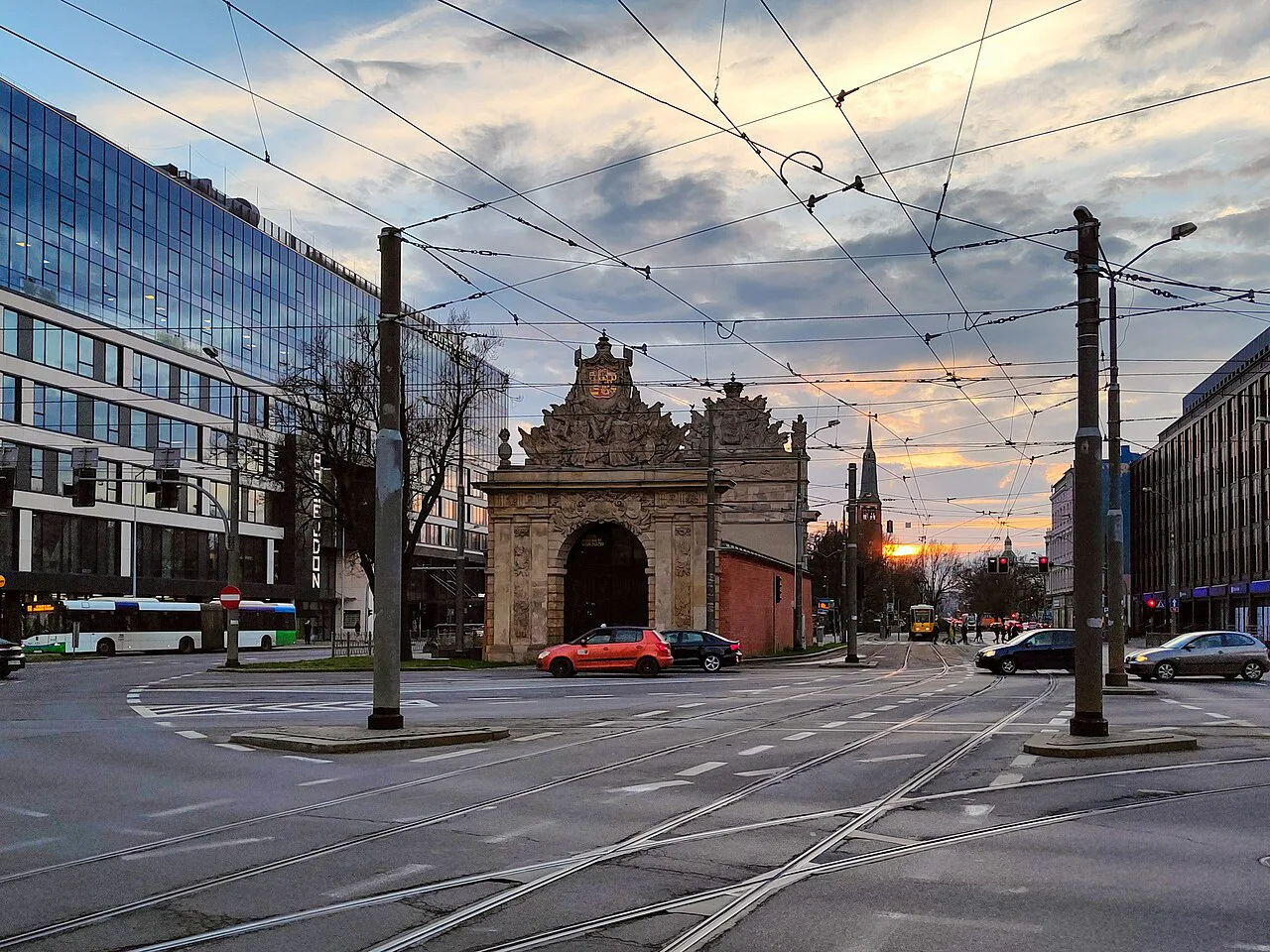 The Brama Portowa gate on Brama Portowa Square in Szczecin at sunset.