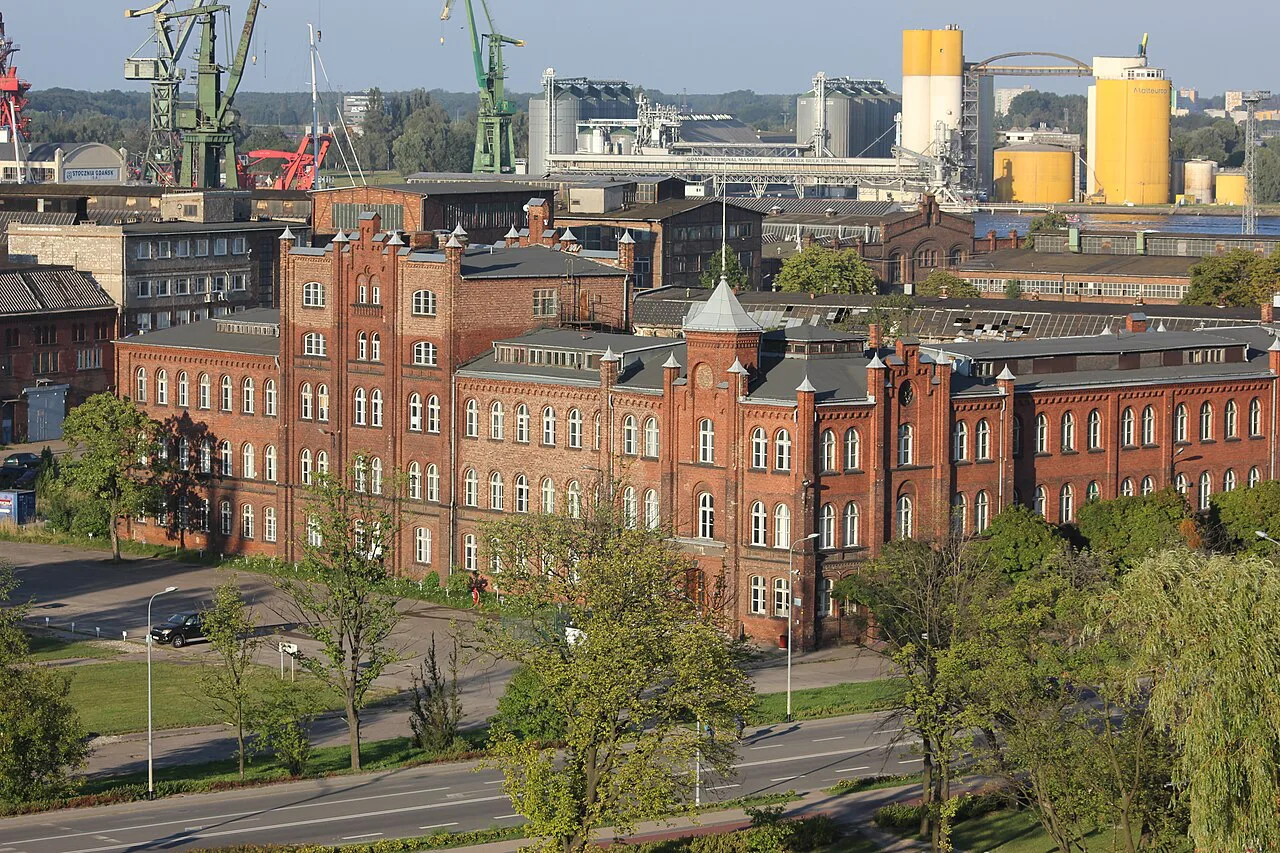 Shipyard buildings and cranes seen from the European Solidarity Centre terrace in Gdańsk.