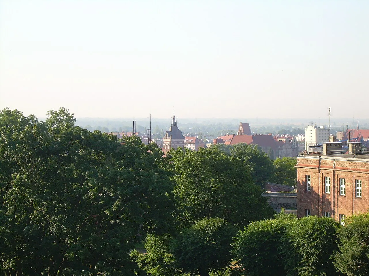 Gdańsk rooftops seen from the wooded slopes of Góra Gradowa.
