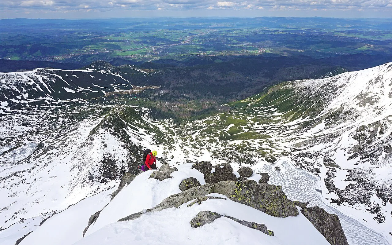 Hikers approaching the summit of Kościelec in the Tatra National Park.