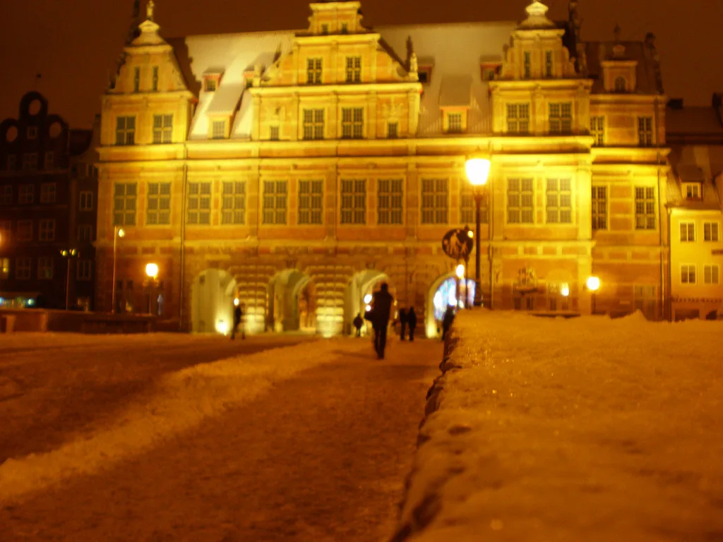 The Green Gate in Gdańsk at night.