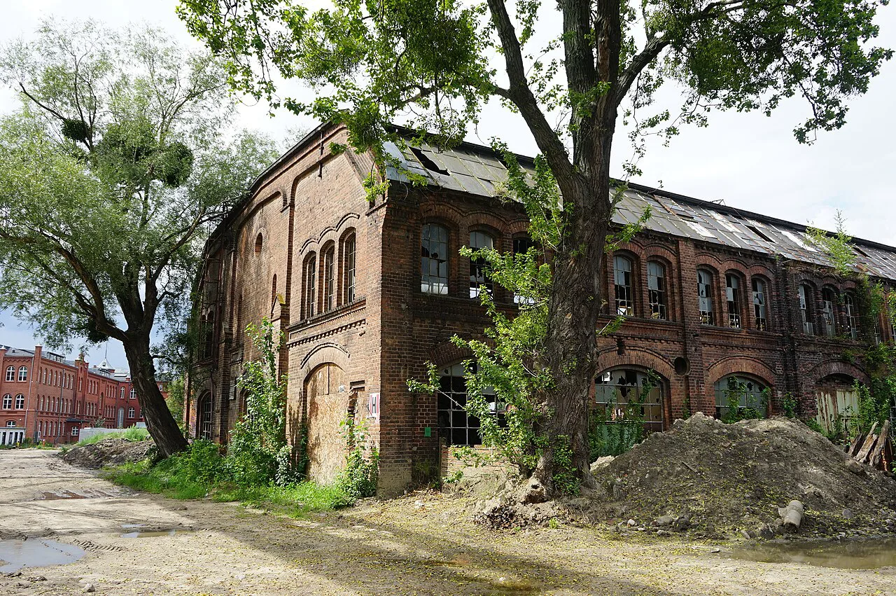 An old brick building in the Cesarska Shipyard in Gdańsk.