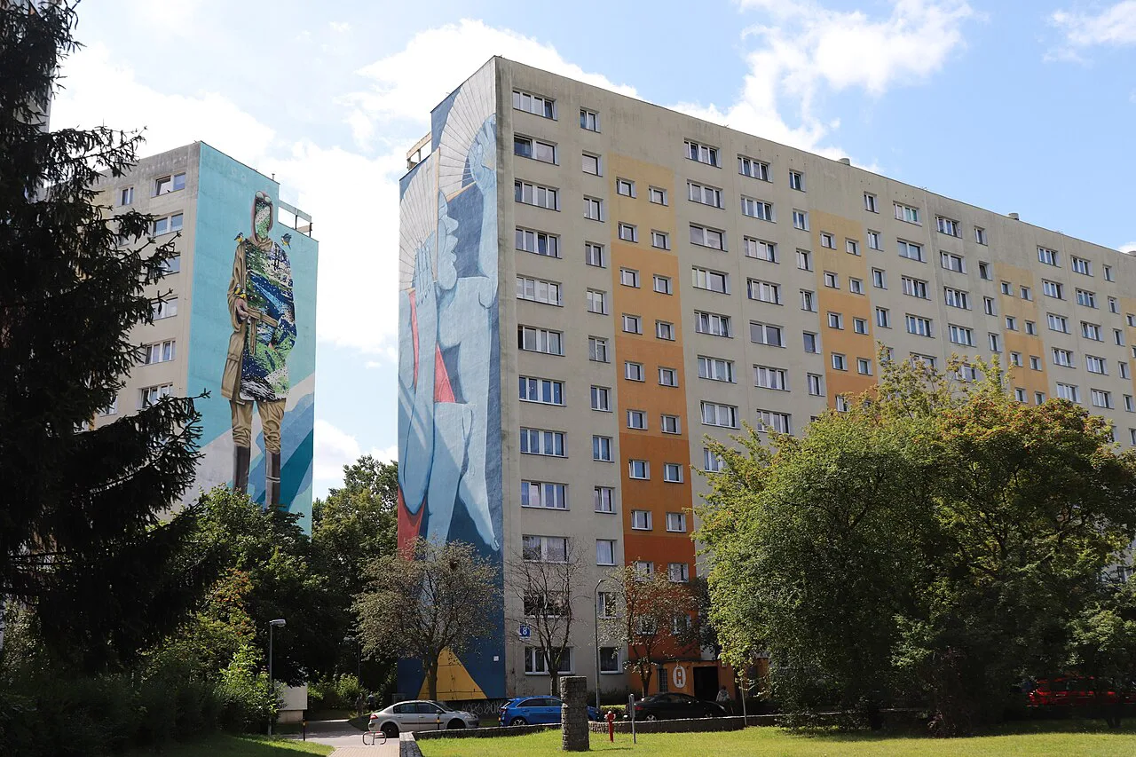 Murals by Shai Dahan and Run on apartment blocks in Zaspa, Gdańsk.