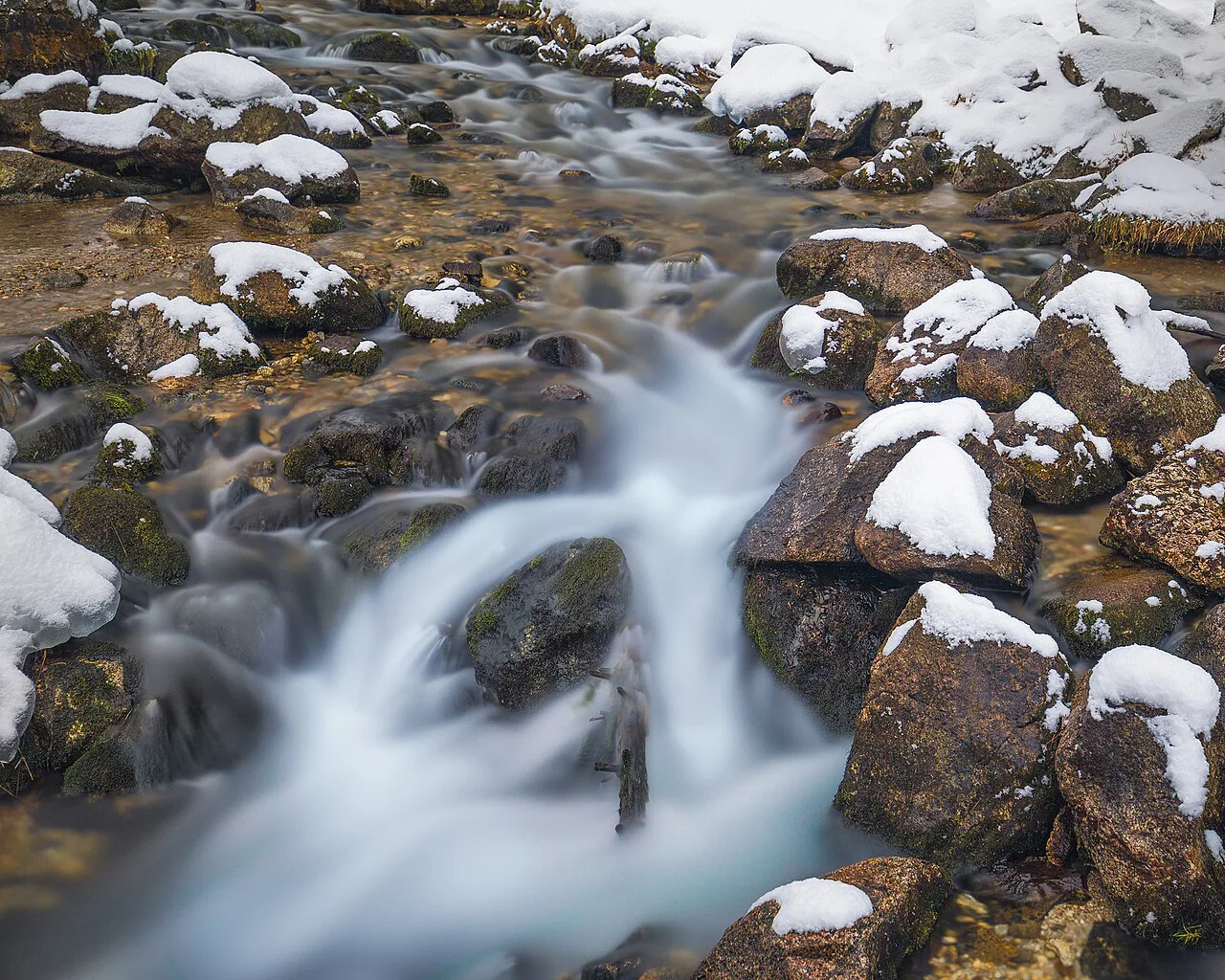 A mountain river in winter in Tatra National Park.