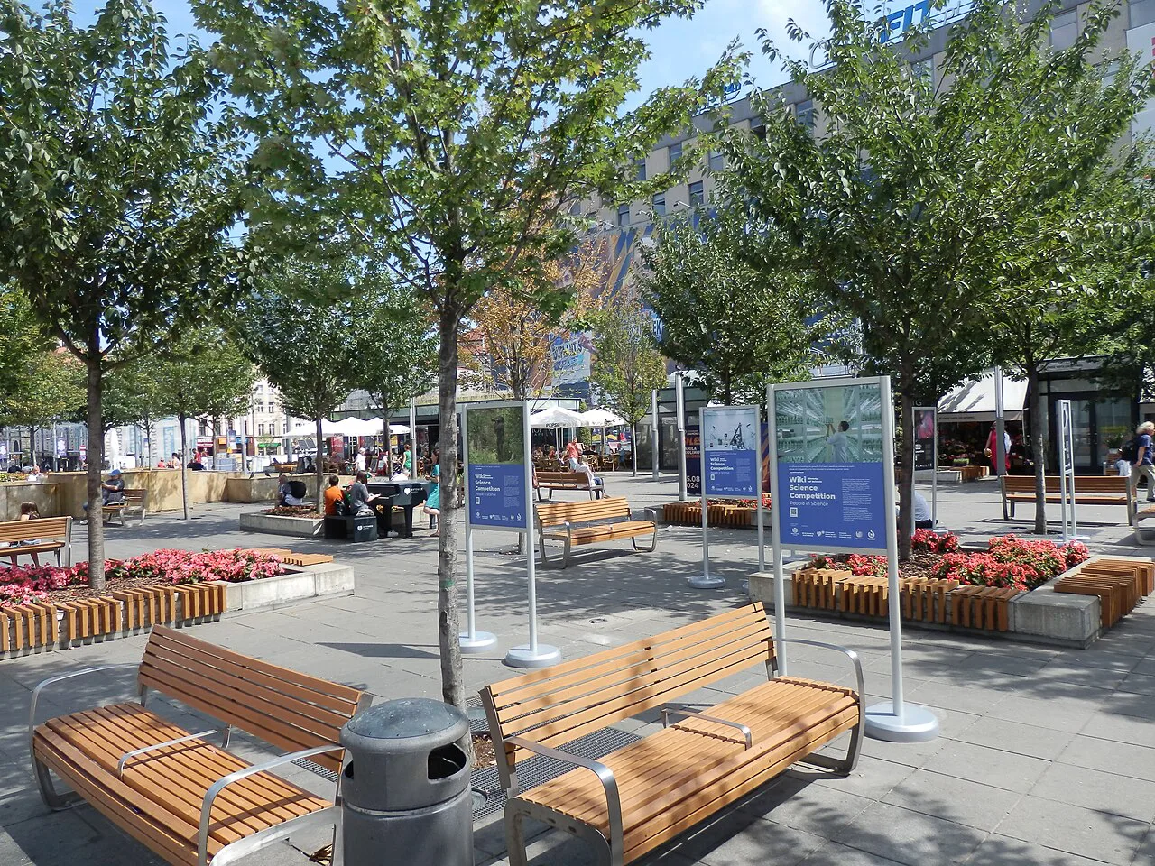 Benches, flower beds and exhibition boards on the Market Square in Katowice.