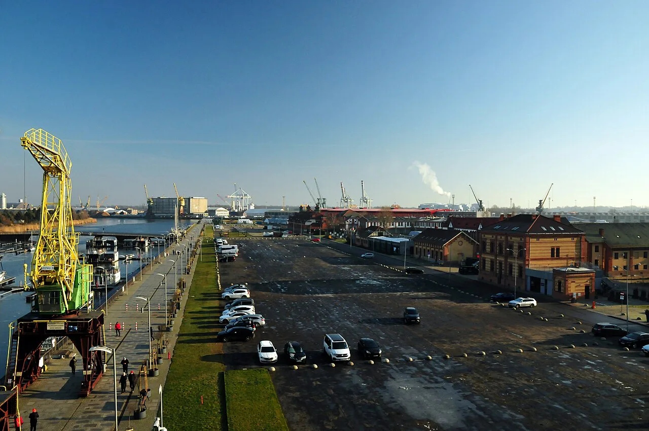 The Łasztownia quayside and a yellow port crane in Szczecin.