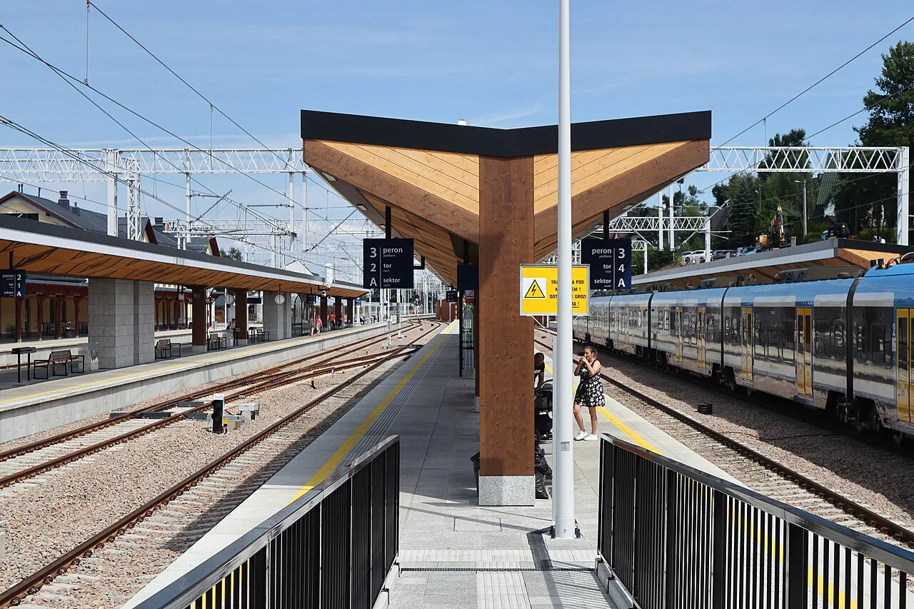 A train under the new platform canopies at Zakopane railway station.