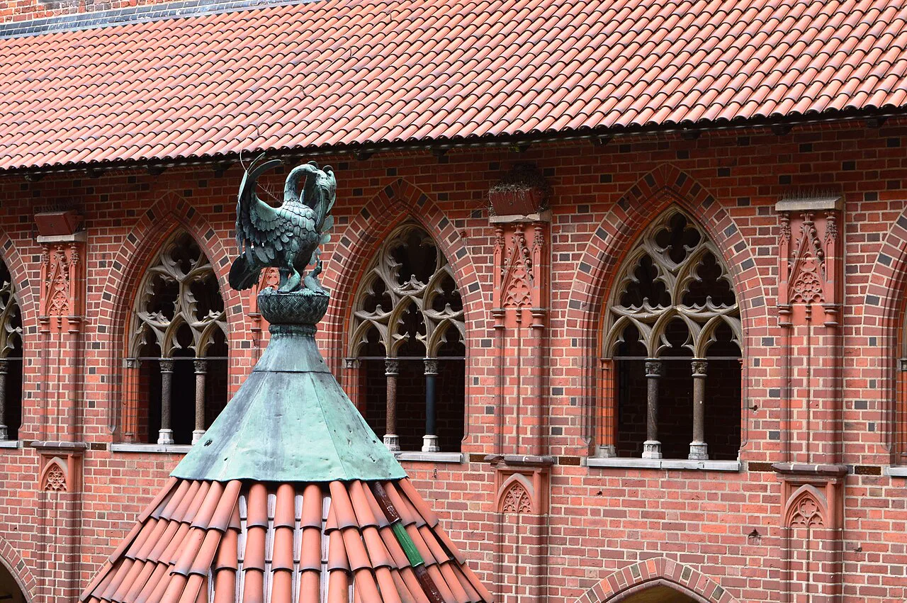 Gothic windows and a turret at Malbork Castle.