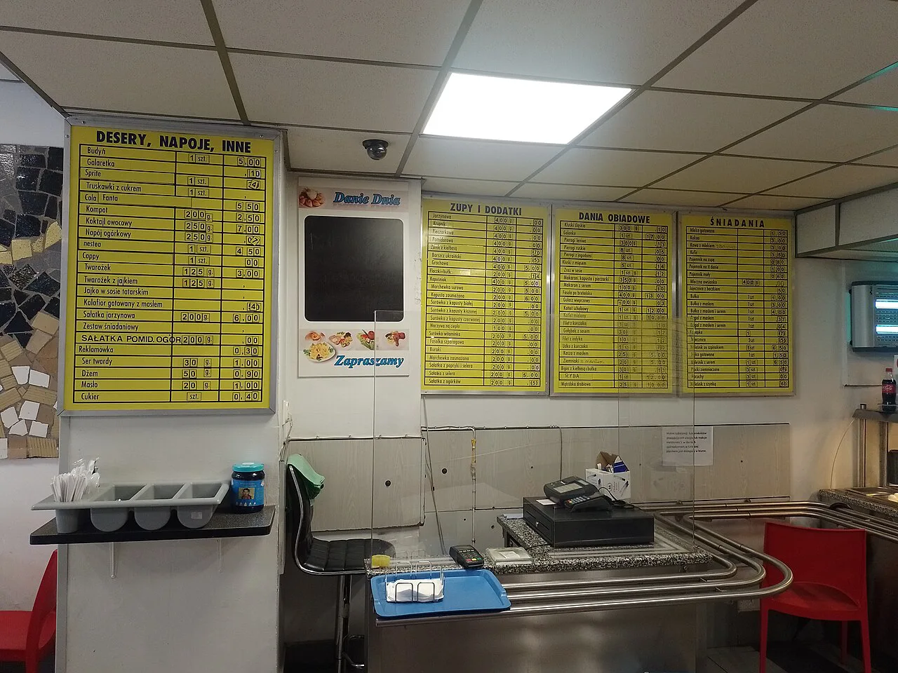 The till and menu boards at the Europa milk bar in Katowice.