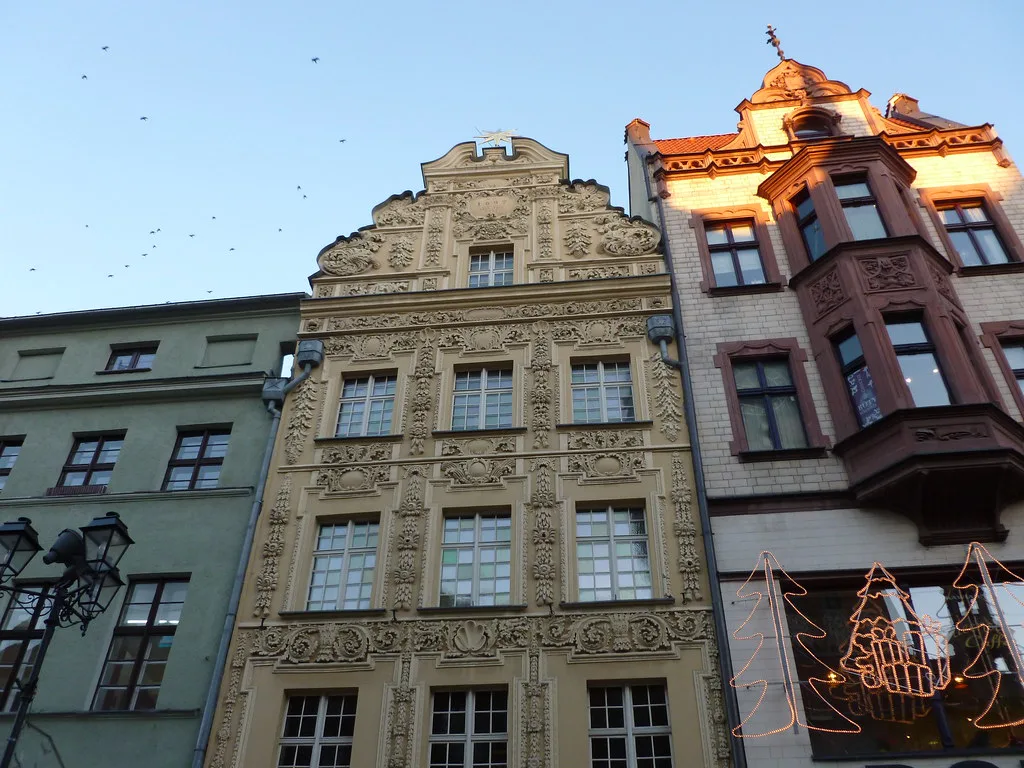 Ornate townhouse facades in Toruń's Old Town.