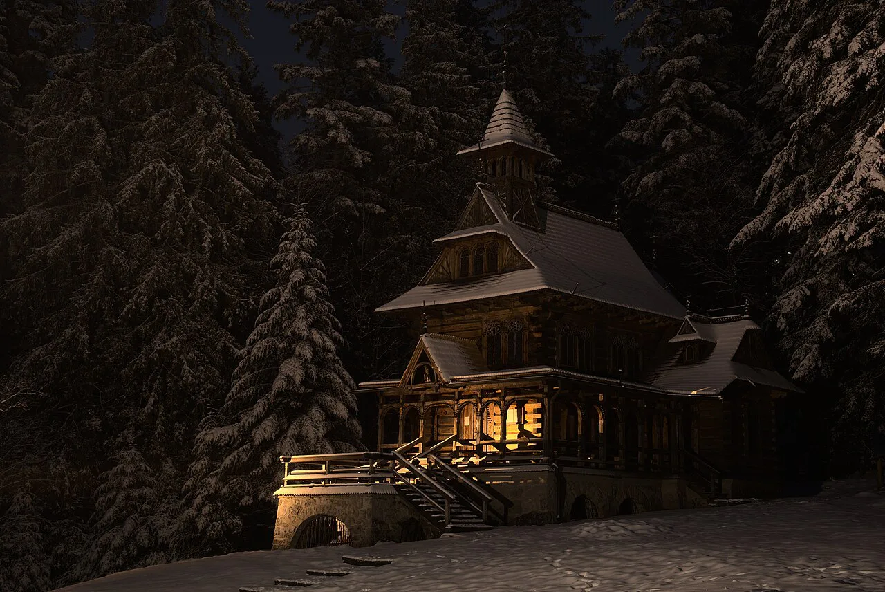 The Chapel of the Sacred Heart in Jaszczurówka, Zakopane, on a winter night.