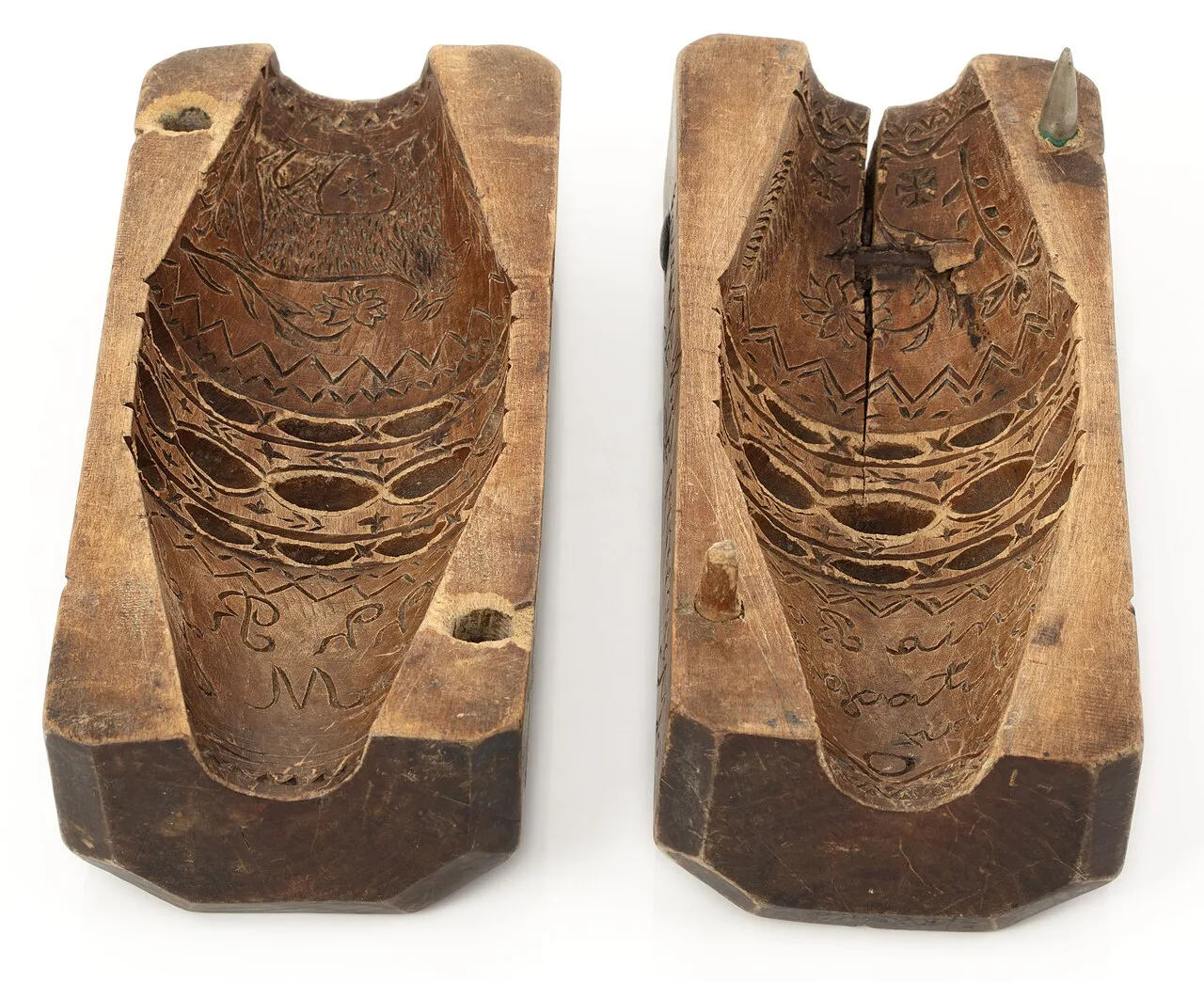 A two-part wooden oscypek mould, opened, in the Tatra Museum collection.