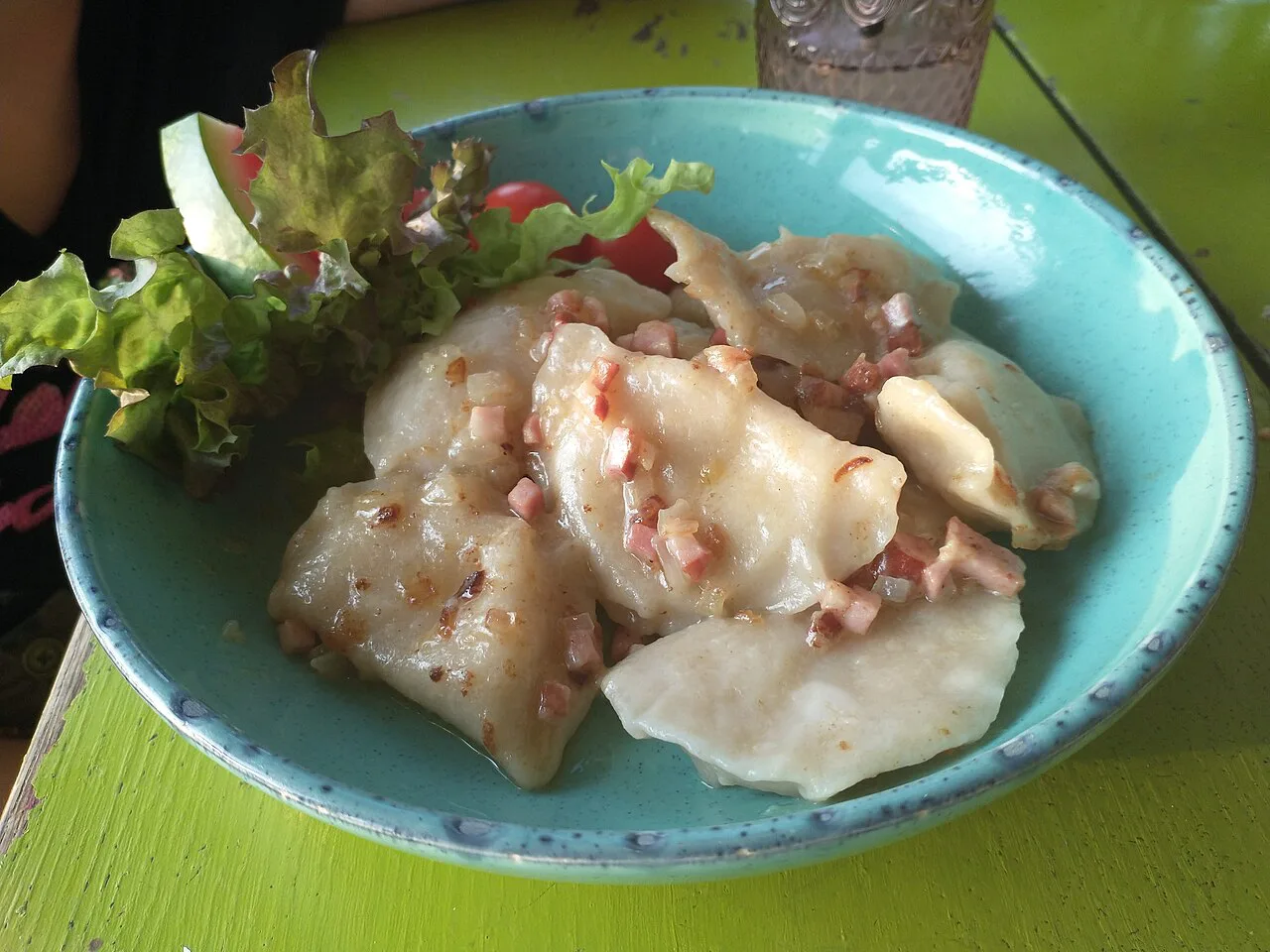 Pierogi ruskie with salad at a restaurant in Oborniki.