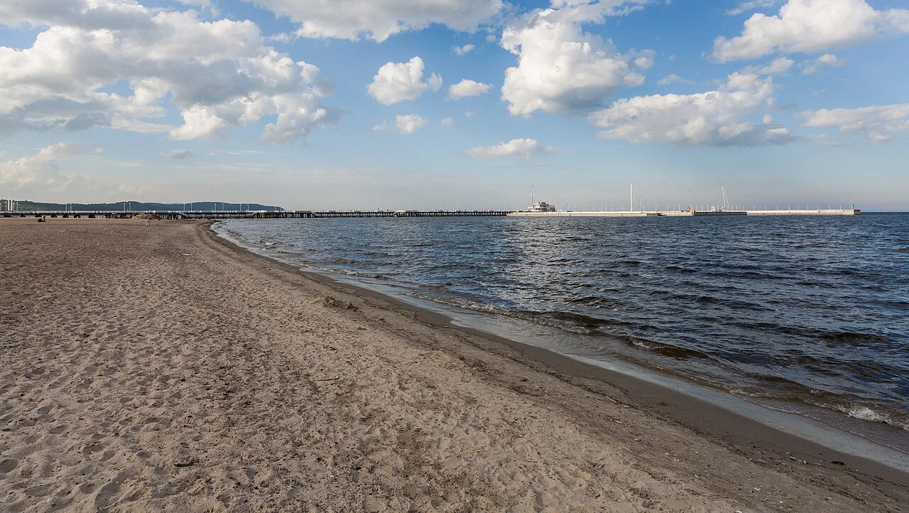 The sandy beach by Sopot pier.