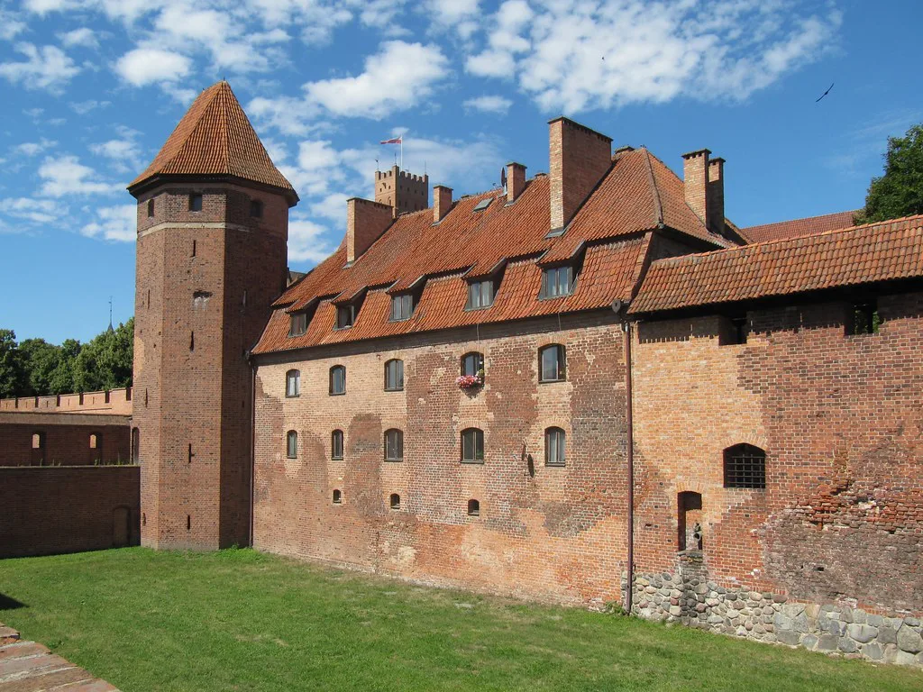 Brick walls and towers of Malbork Castle.