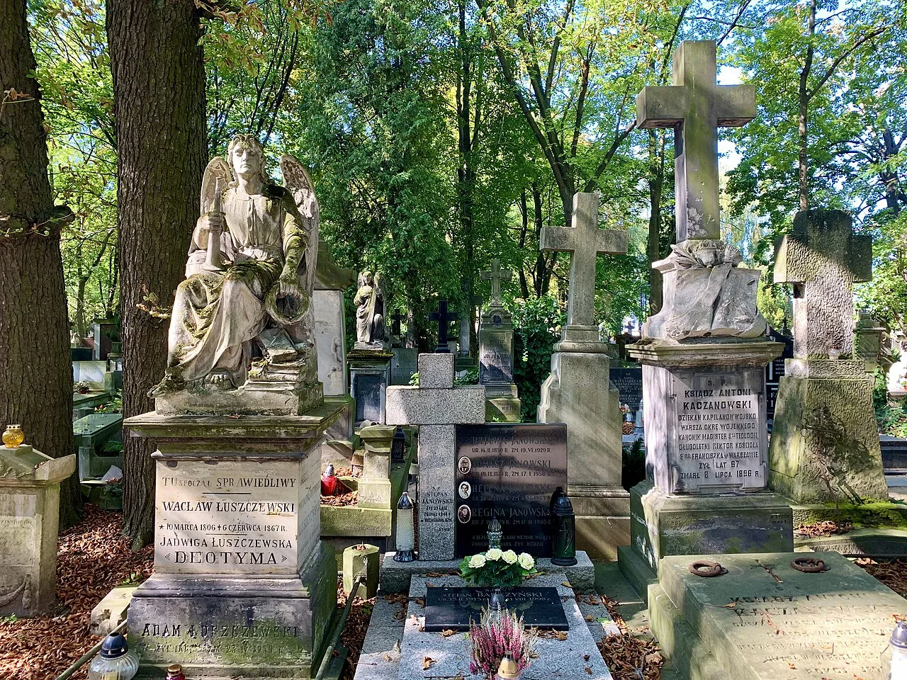 Sculpted tombstones at Powązki Cemetery in Warsaw.
