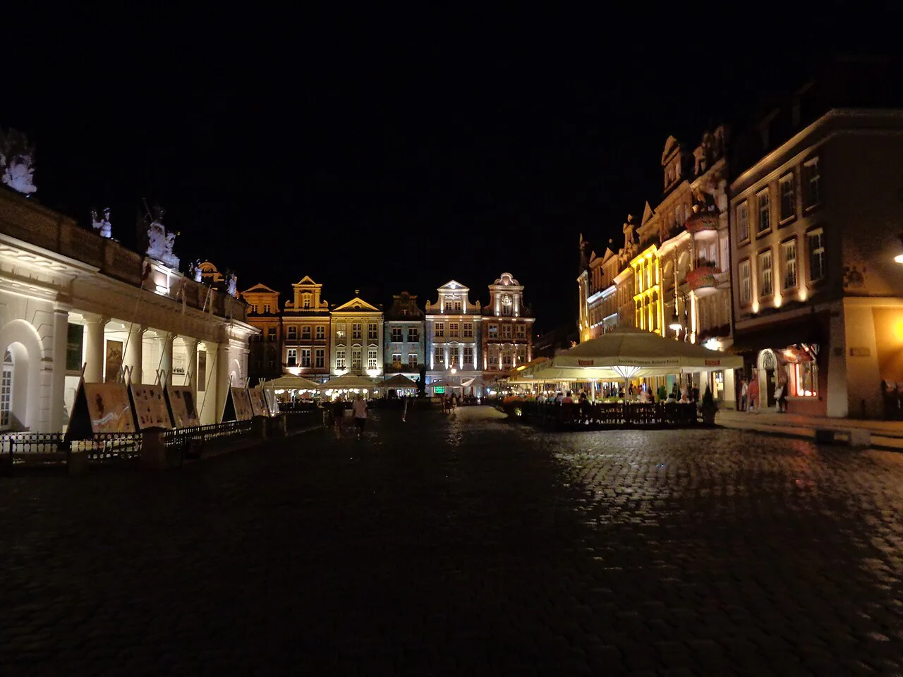 Poznań's Old Market Square at night.