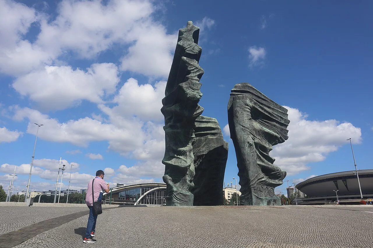 The Silesian Insurgents' Monument in Katowice, with the Spodek behind.