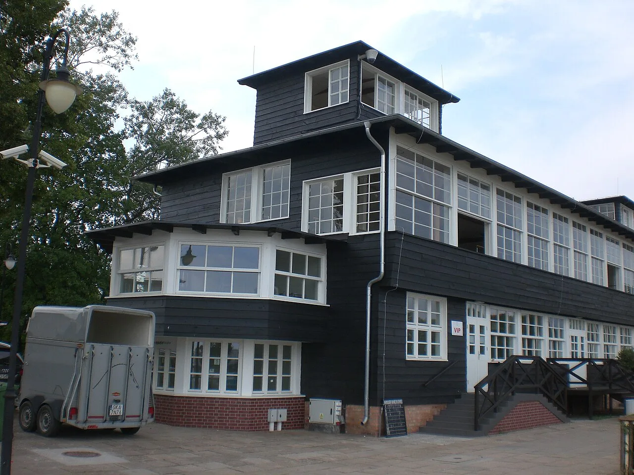 A black timber building at the Sopot Hippodrome.