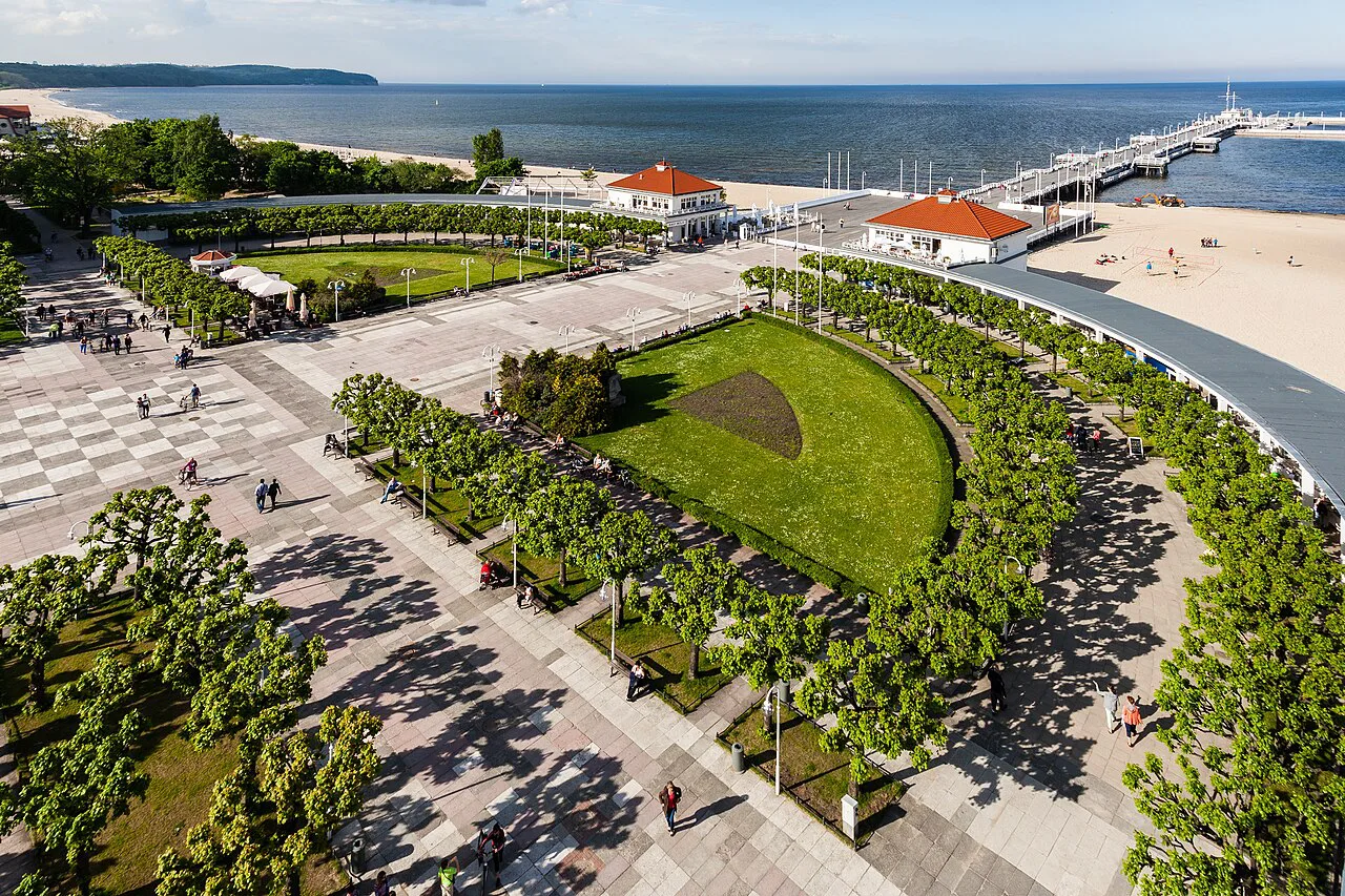 Aerial view of the Sopot pier, beach and seafront gardens.