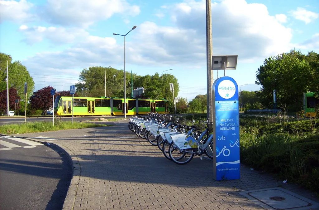 City bikes and a tram at Rondo Śródka in Poznań.