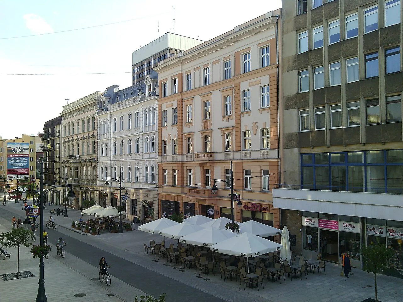 Café terraces and tenement houses in central Łódź.
