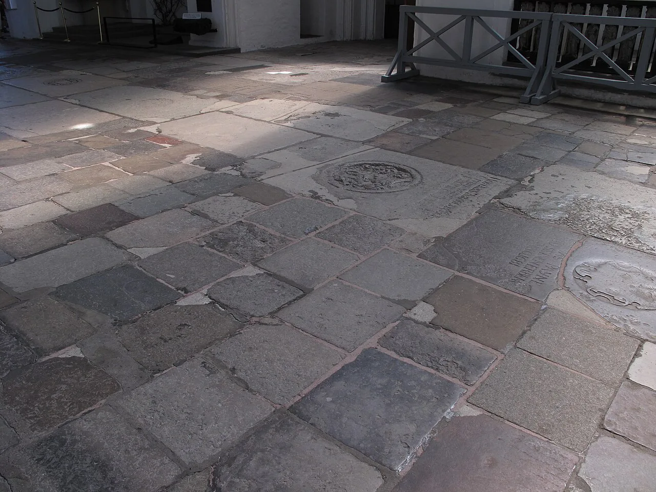 Stone floor with memorial slabs inside St Mary's Church in Gdańsk.