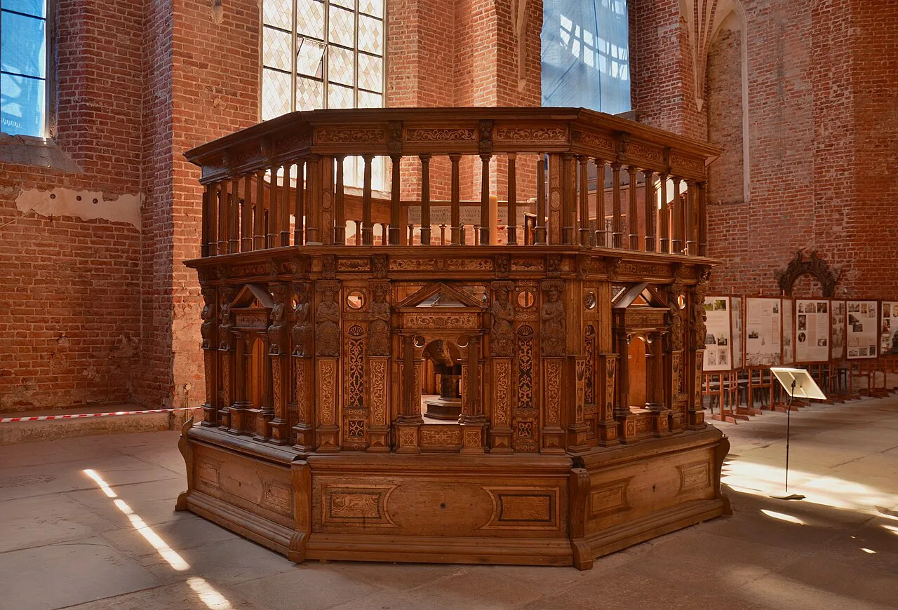 The carved 1585 baptistery in St Catherine's Church, Gdańsk.