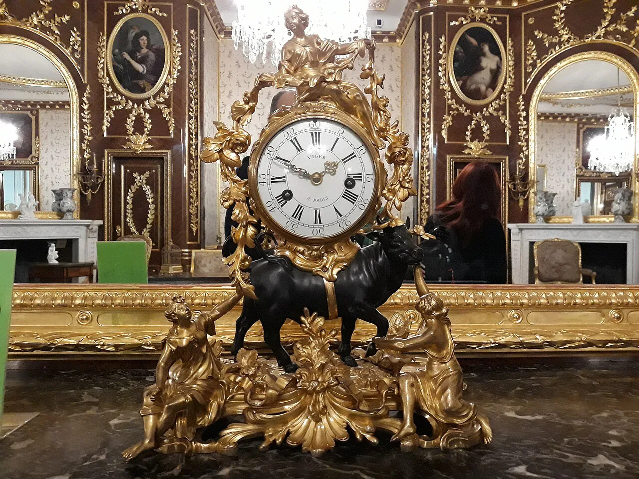 An ornate clock in a room of the Royal Castle in Warsaw.