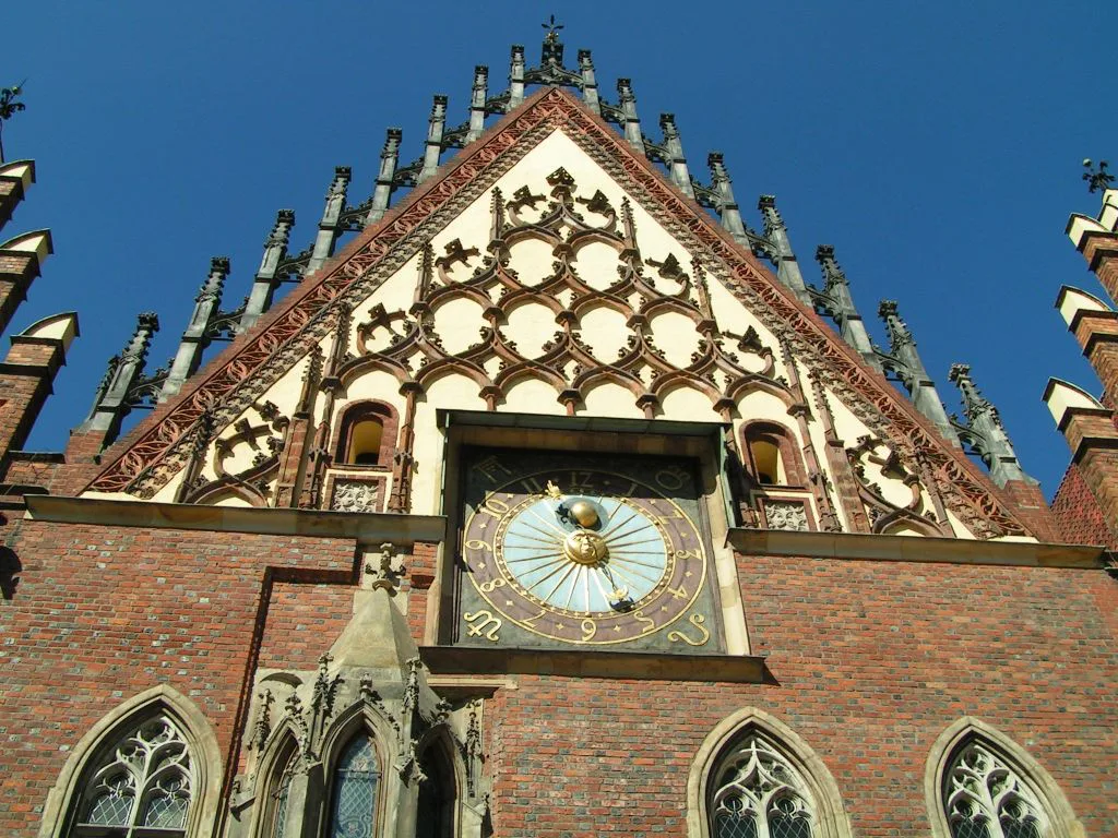 The old clock on the gable of Wrocław's Old Town Hall.