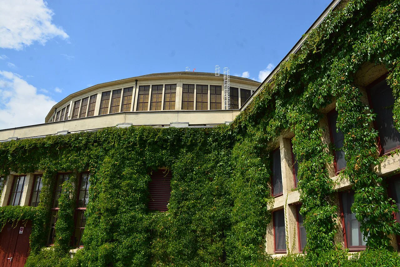 Ivy-covered walls beside Centennial Hall in Wrocław.