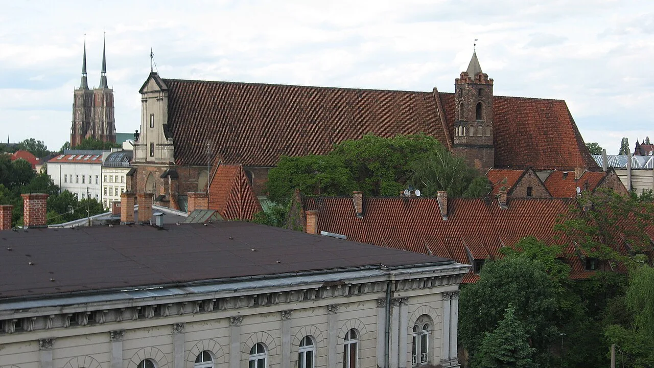 Rooftop view of the Museum of Architecture in Wrocław, with the cathedral spires in the distance.